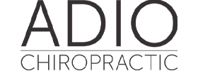 Close-up of ADIO Chiropractic brand name in modern font