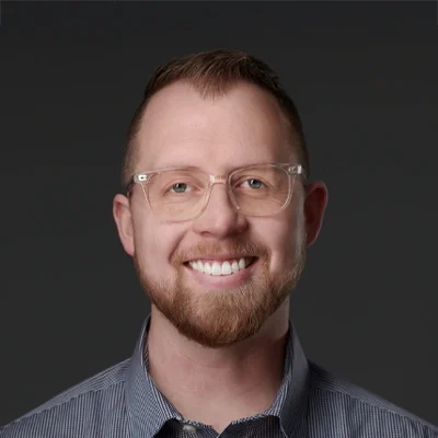 Studio portrait of a person with short hair